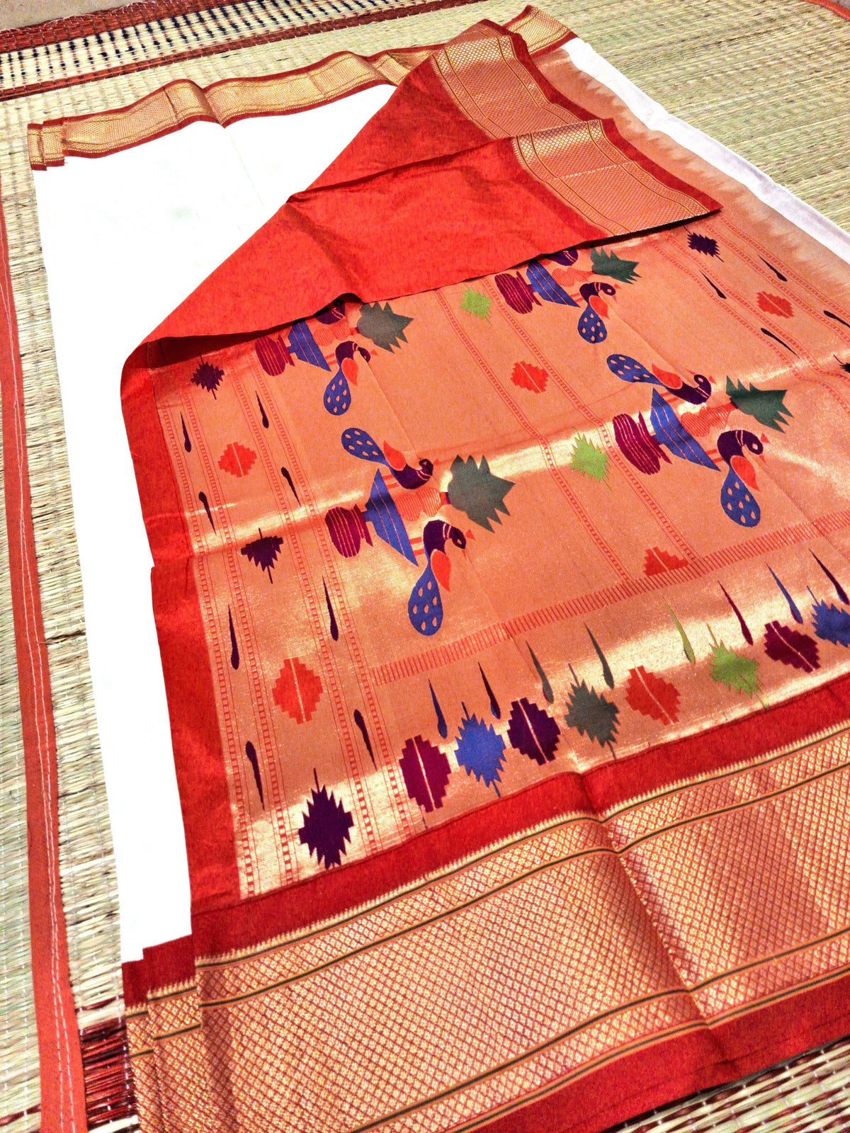 White and red Paithani silk saree pallu and border detail